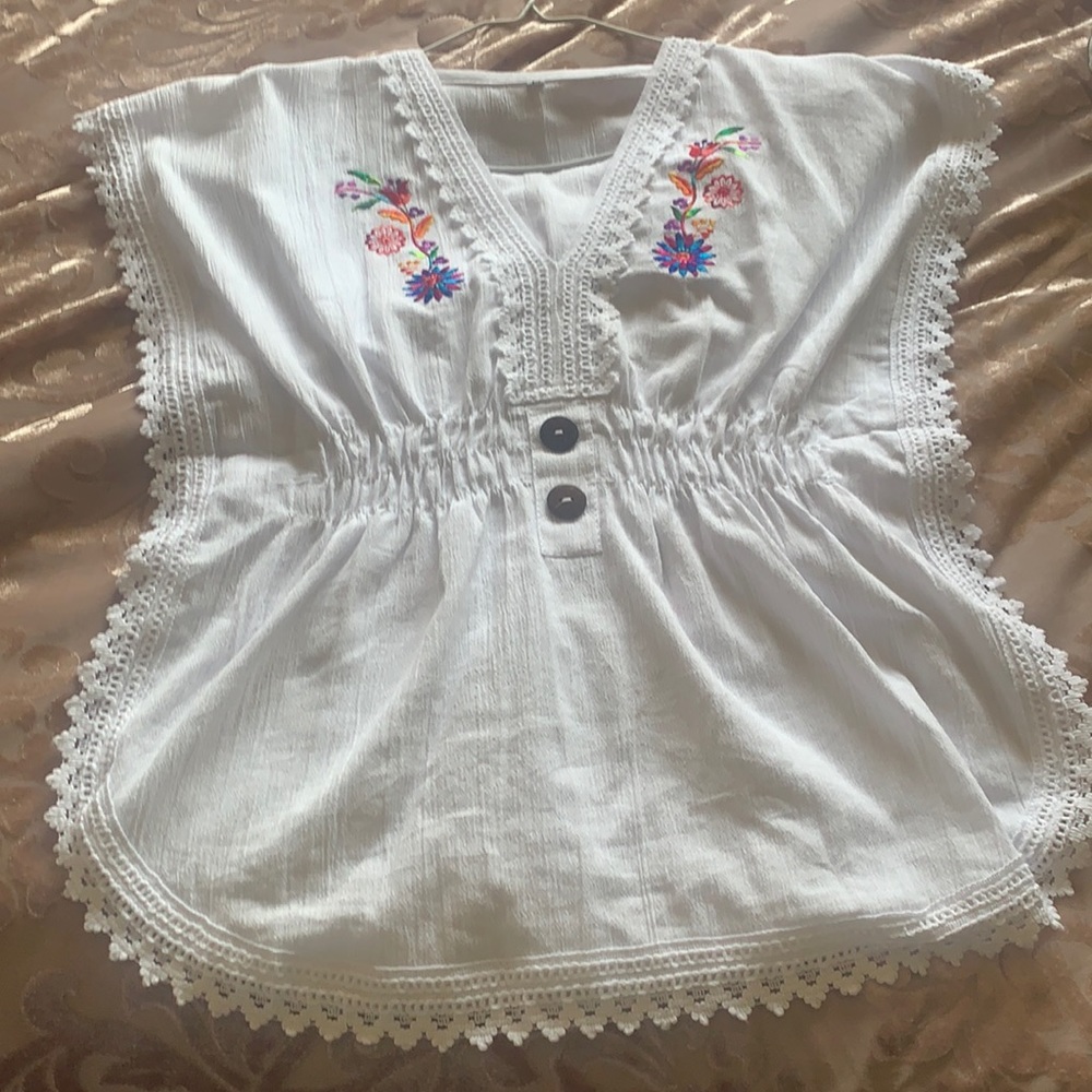 Native American threaded blouses.